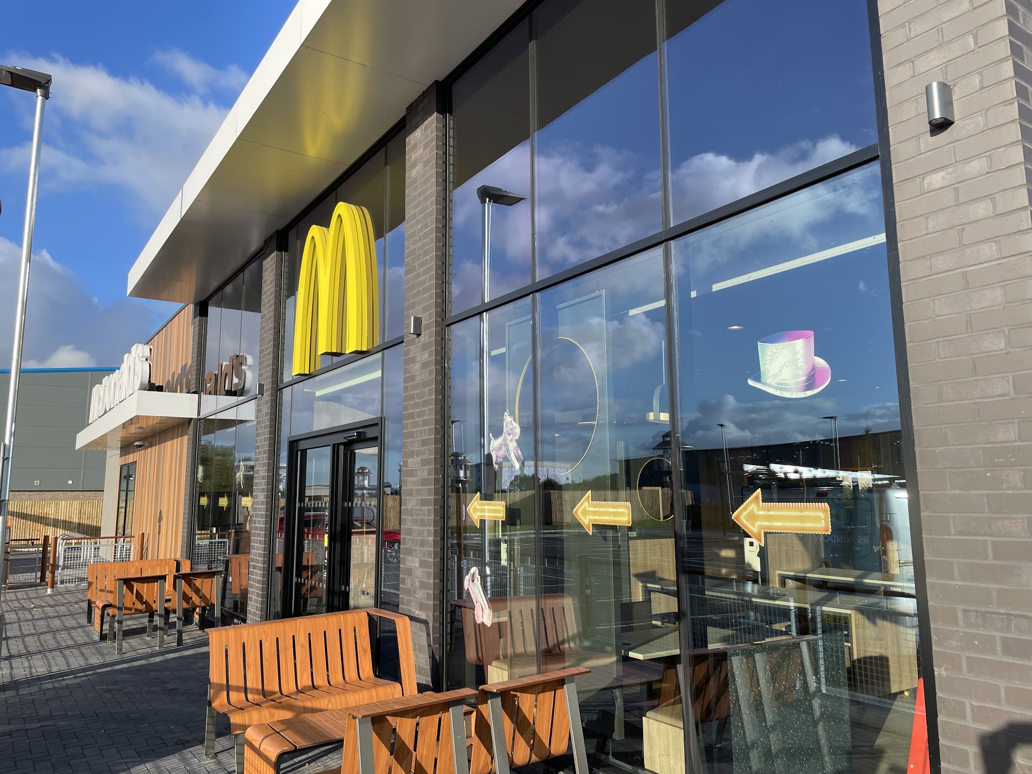 Clean glass frontage of a restaurant on a sunny day